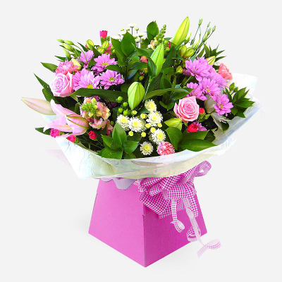 Ashleigh  - A budding delight, complimented by greenery and presented in a gift box/bag. Beautiful flower bouquet hand delivered by the local florist.       