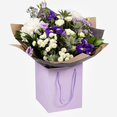 Violet - An impressive hand-tied of purple and white flowers, presented in a complimentary gift bag or box to make your gift feel extra special. 
