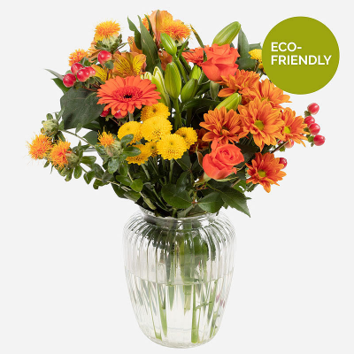 Orange Sky - A beautiful Autumn inspired vase of flowers. Filled with a burst of stunning orange, yellow and red blooms. Specially made and delivered by a professional florist. This is a gift that promises to leave a lasting impression. 