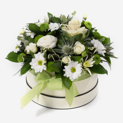 Olivia - A stunning arrangement of luxurious flowers in a white & cream colourway. Made to impress in a stylish hat box.  
